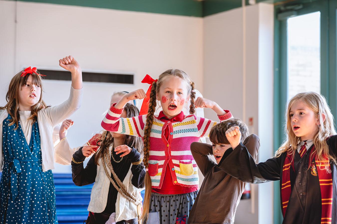 Children taking part in a drama workshop