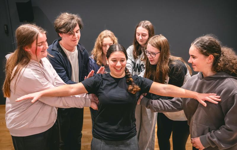 Teenagers in a theatre workshop
